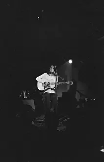 Songwriter Prints: Joan Baez Playing Guitar on Stage