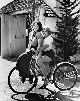 Handlebars Prints: Joan Blondell and Sister Riding Bicycle