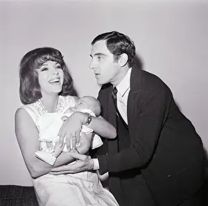Joan Collins and Anthony Newly with Baby
