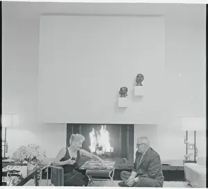 Joan Crawford and Alfred Steele Relaxing by Fireplace