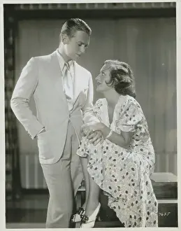 Prints of (Original Caption). Joan Crawford, beautiful Metro-Goldwyn-Mayer star, with her husband, Douglas Fairbanks, Jr A Glamorous Life Captured: Joan Crawford and Douglas Fairbanks Jr