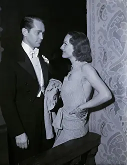 Prints of (Original Caption) 12/29/1933-Los Angeles, CA: Joan Crawford and Franchot Tone at Cocoanut Grove Hotel A Glamorous Life Captured: Joan Crawford, Franchot Tone At Hotel
