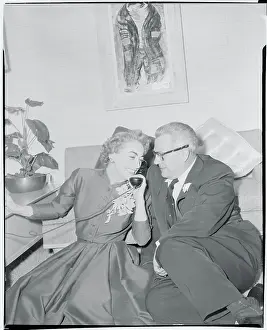Joan Crawford and Husband Listening on Telephone