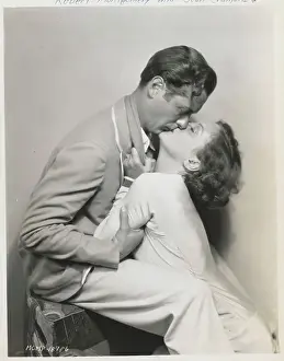 Prints of Joan Crawford and Robert Montgomery staring in the motion picture Untamed directed by Jack Conway A Glamorous Life Captured: Joan Crawford Kissing Robert Montgomery