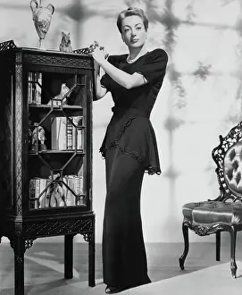 Joan Crawford Posing in Black Dinner Dress