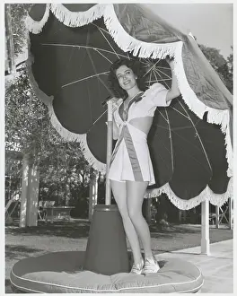 Joan Crawford Posing Under Large Umbrella