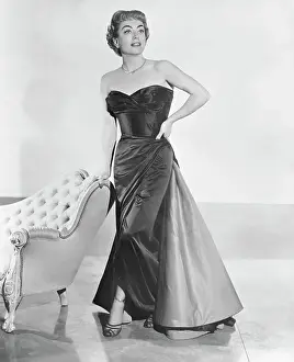 Joan Crawford Posing in Satin Gown