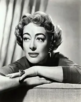 Prints of JOAN CRAWFORD (1908-1973), AMERICAN ACTRESS.UNDATED PHOTOGRAPH A Glamorous Life Captured: Joan Crawford in Publicity Photo