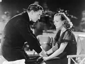 Prints of (Original Caption). Photo shows Spencer Tracy and Joan Crawford in a still from the MGM movie Mannequin. Movie released 1938 A Glamorous Life Captured: Joan Crawford & Spencer Tracy In Movie