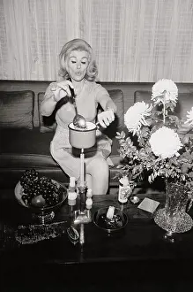 Joan Rivers Cooking over a Candle