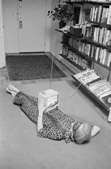 Joan Rivers Laying on Floor with TV