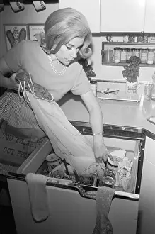 Dishwasher Prints: Joan Rivers Pulling Clothes from Dishwasher