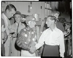Jockey Eddie Arcaro Shaking Willie Hartack's Hand