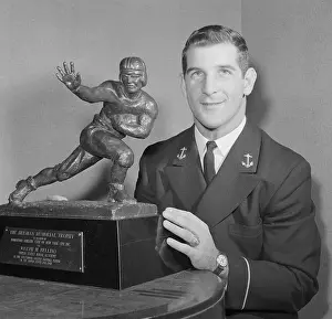 Joe Bellino Posing with Heisman Trophy