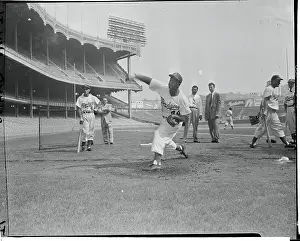 Joe Black Pitching a Baseball