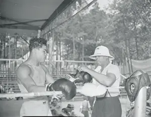 Joe Blackburn Removing Joe Louis Gloves