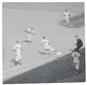 Joe Collins Tossing Ball to Tom Gorman