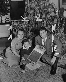 Joe DiMaggio and Dorothy Arnold Under Christmas Tree with Joe Jr