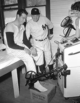 Joe DiMaggio Getting Heel Checked with Casey Stengel