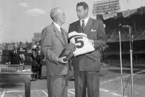 Joe DiMaggio Handing in Uniform