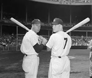 Joe DiMaggio and Mickey Mantle Holding Bats