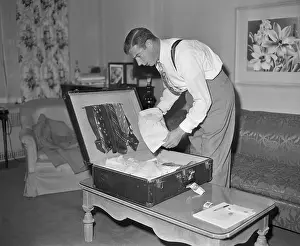 Joe DiMaggio Packing a Suitcase