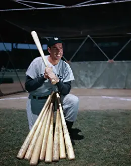 Joe DiMaggio Posing with Baseball Bat Collection