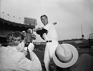 Photojournalist Prints: Joe DiMaggio Posing for Photographers