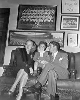 Joe DiMaggio Posing with His wife and Son