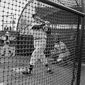 Joe DiMaggio Practicing Batting in Cage