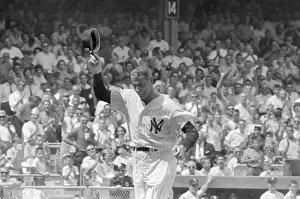 Joe Dimaggio Raises Hat to Crowd