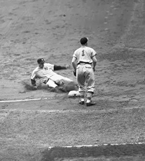 Joe DiMaggio Safely Sliding Into Third Base