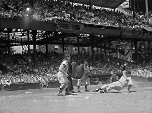 Joe DiMaggio Sliding Home