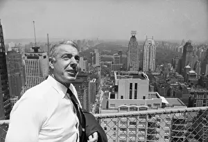 Joe DiMaggio Standing on Rooftop