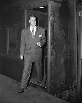 Joe Dimaggio Steps Off His Train