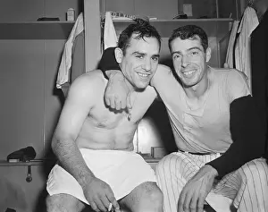 Joe DiMaggio and Yoggi Berra Sitting in Locker Room
