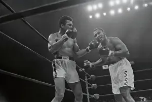 Joe Frazier and Muhammad Ali in Boxing Action