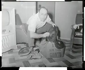 Joe Garagiola Searching in His Baseball Grip