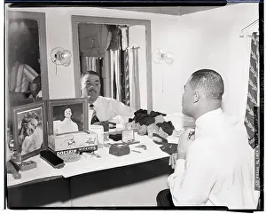 Joe Louis Adjusts His Tie