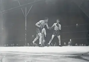 Endurance Prints: Joe Louis and Billy Conn in Boxing Action