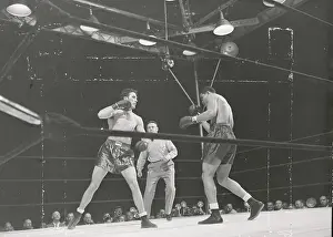 Joe Louis and Billy Conn in Fighting Action