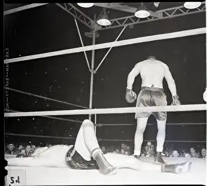 Down Prints: Joe Louis Downs Buddy Baer