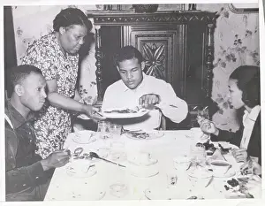 Joe Louis Eating Dinner with Family