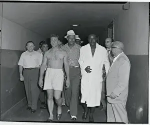 Joe Louis Escorting Ezzard Charles and Gus Lesnevich