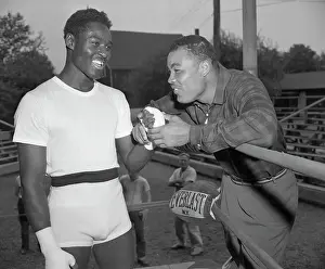 Joe Louis and Ezzard Charles Conversing
