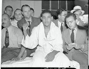 Joe Louis Gesturing a Win