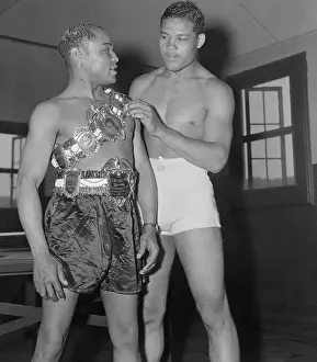 Joe Louis Helping Henry Armstrong with Belt