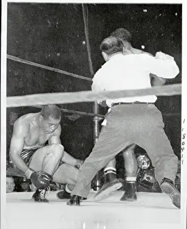 Joe Louis Being Knocked Through Ropes