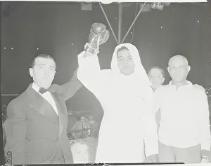 Joe Louis and Officials After Winning Bout with Lou Nova