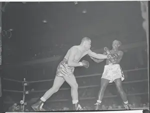 Joe Louis and Omelio Agramonte in Boxing Action